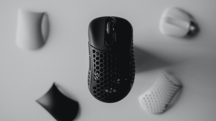 A black honeycomb design gaming mouse