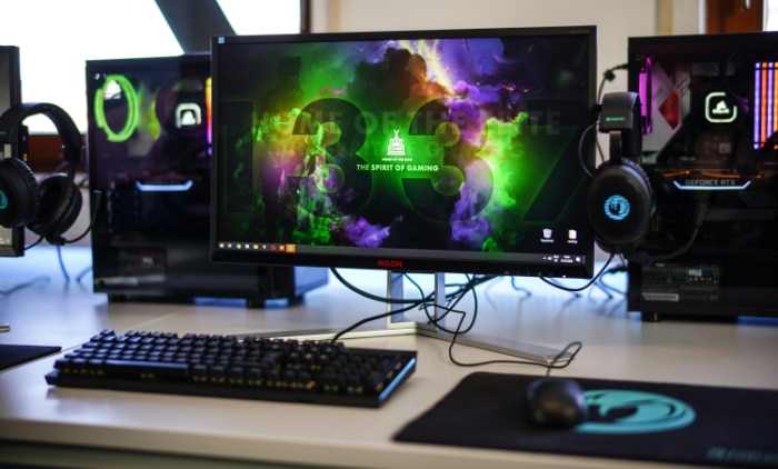 A gaming monitor displaying colorful graphics