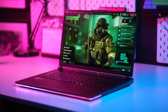 ASUS ROG gaming laptop displaying a video game