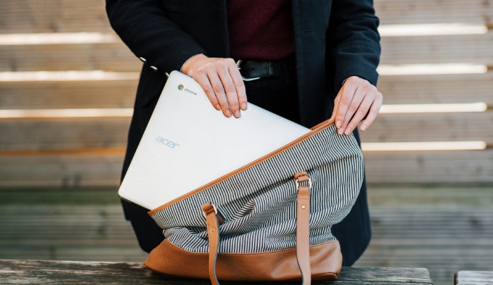 White Acer Chromebook in bag