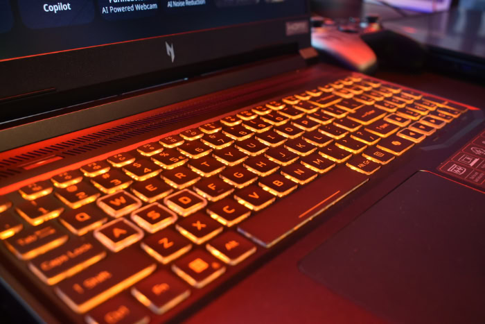 Acer gaming laptop keyboard with orange RGB backlighting