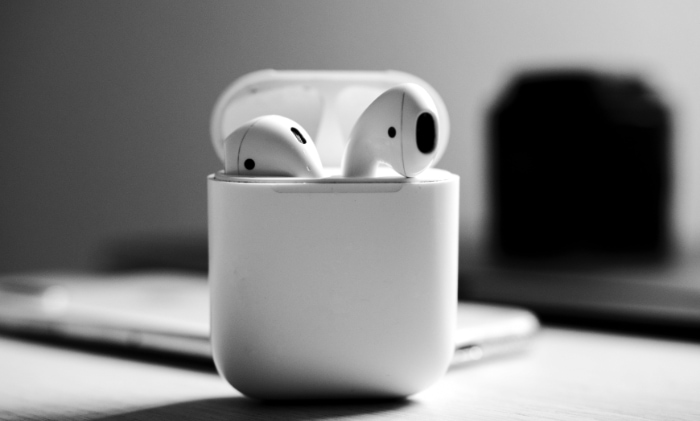 AirPods case opened on table