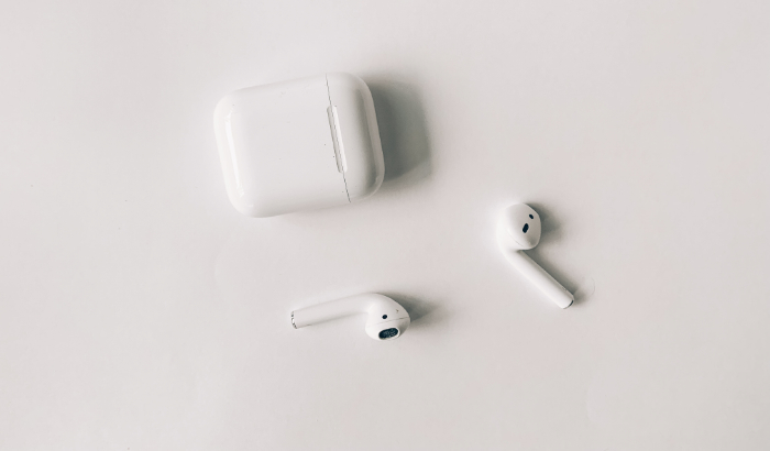 AirPods outside case on white background
