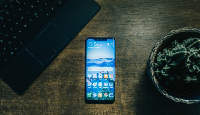 Android phone on wooden desk