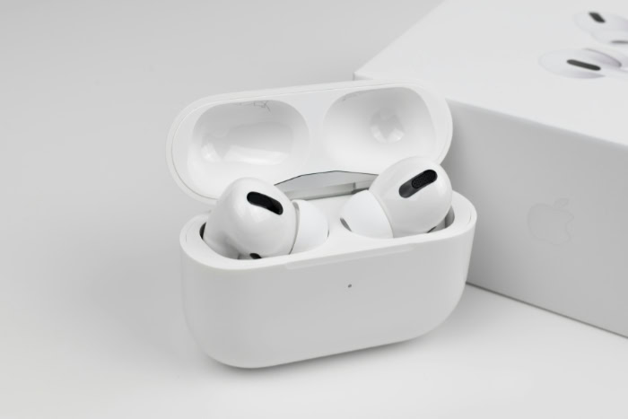 Apple AirPods Pro 2 in case next to