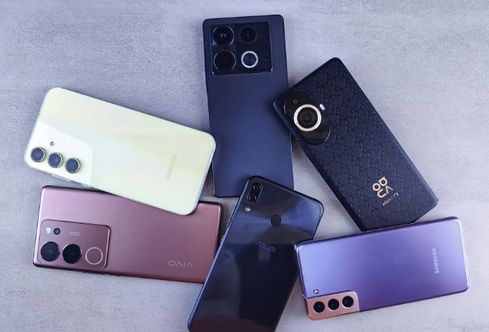 Assorted Android smartphones from different brands on table