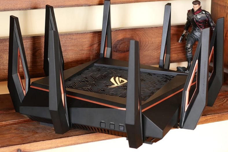 Black Asus RoG Rapture GT-AX11000 near action figure