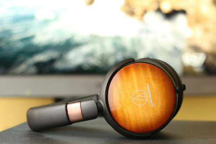 Audio Technica headphones with wood grain ear cup finish
