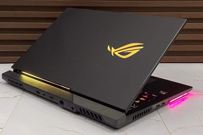 Back view of a gaming laptop with illuminated logo