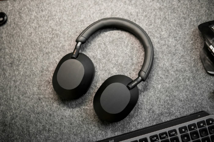 Black Sony headphones near Logitech keyboard