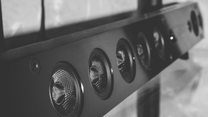 Black and white close up of a soundbars speakers