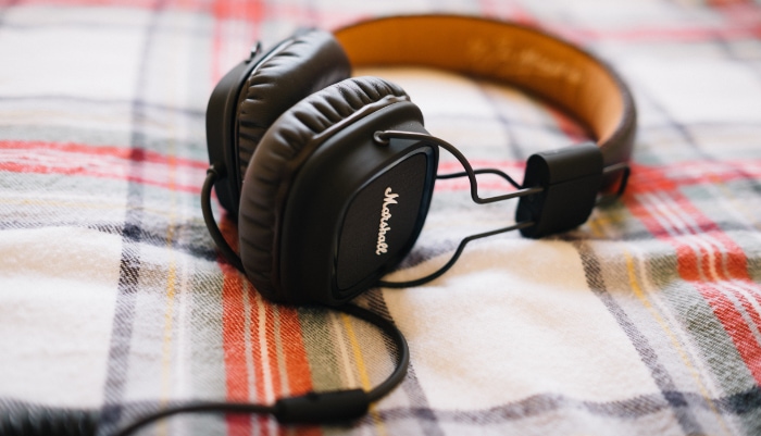 Black marshall headphones on cloth
