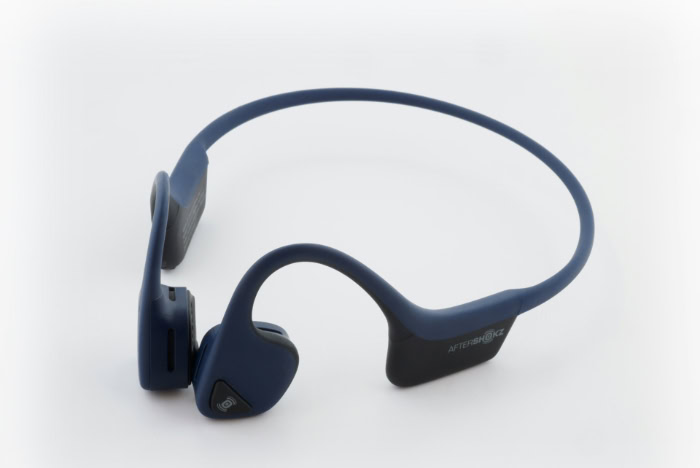 Blue AfterShokz bone conduction headphones on white background