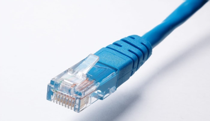 Blue ethernet cable on white background