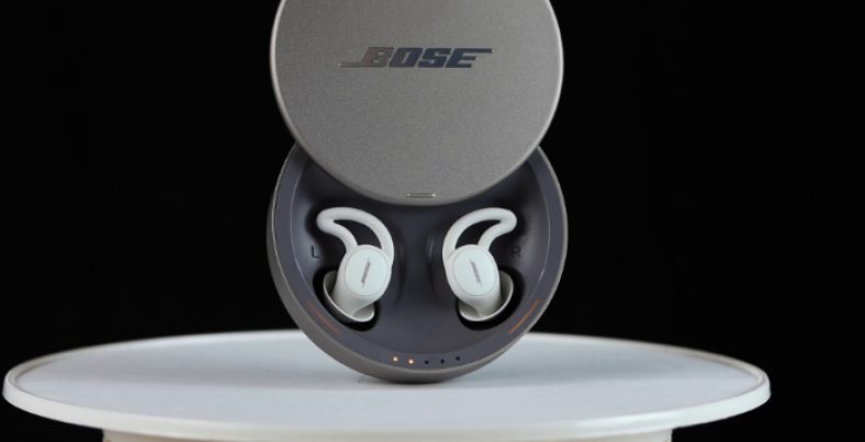 White Bose Sleepbuds II inside case open on white surface