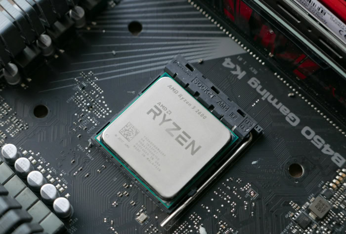 Close up of AMD Ryzen 5 2600 CPU on motherboard