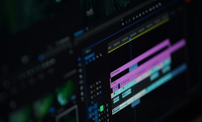 Close up of Adobe Premiere Pros timeline featuring multiple video and audio layers