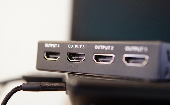 Close up of HDMI splitter showing multiple output ports