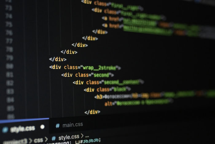 Close up of HTML code with CSS file tabs visible