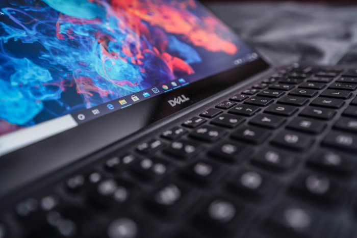 Close up of a Dell laptop screen and keyboard