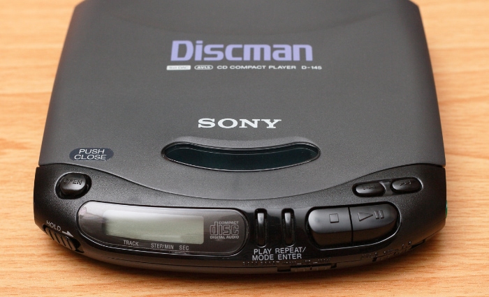 Close up of a black Sony Discman with digital screen