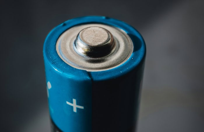 Close up of a blue AA rechargeable battery