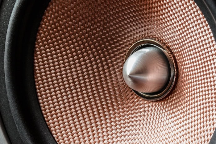 Close up of a copper audio speaker cone