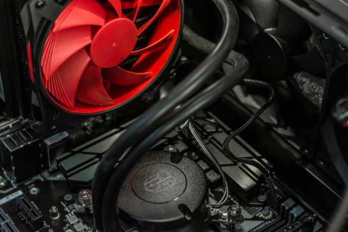 Close up of a red cooling fan inside a PC build