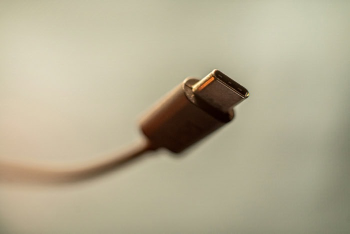 Close up of a single USB C connector in focus