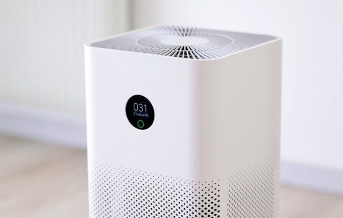 Close up of a white smart air purifier display