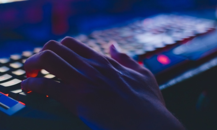 Close up of hand on gaming keyboard