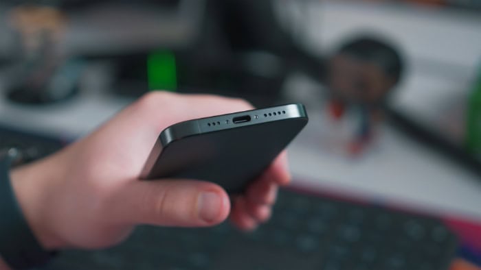 Close up of smartphone showing USB C port and speaker grilles