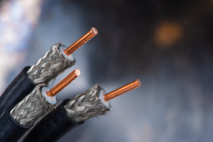 Close up of stripped coaxial cables showing copper conductors
