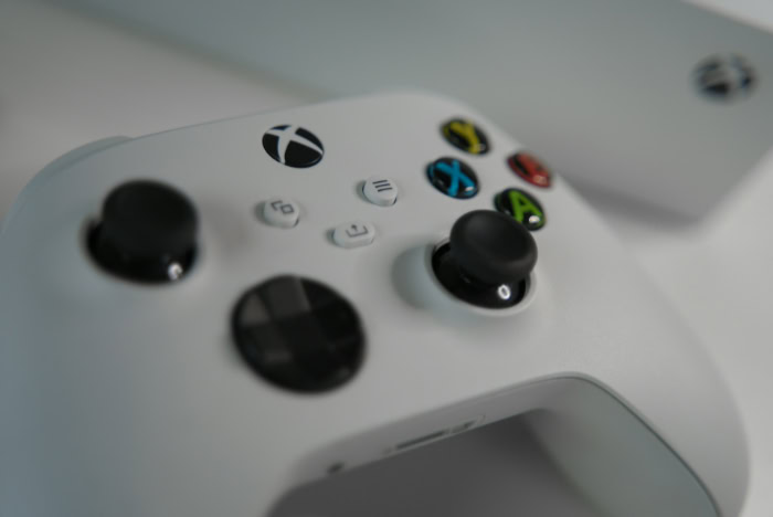 Close up of white Xbox controller buttons
