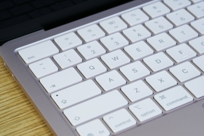 Close up of white keys on MacBook Neo