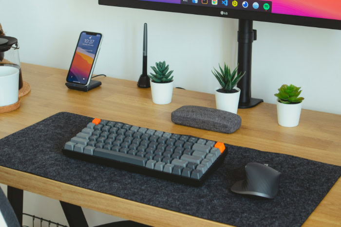 Compact mechanical keyboard on minimalist desk setup