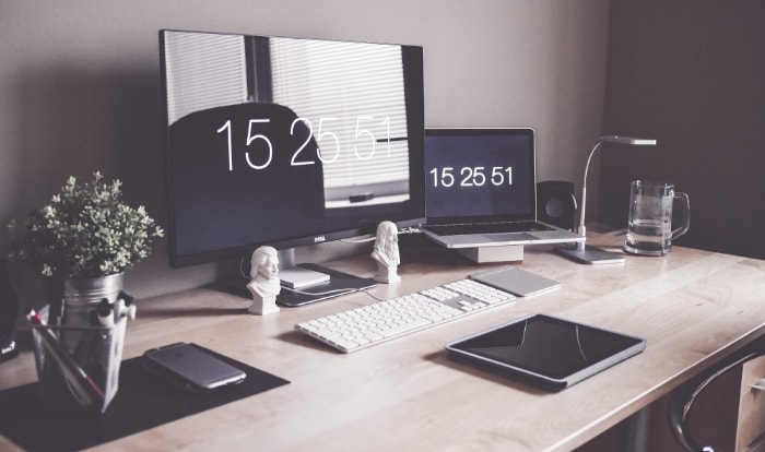 Computer and Laptop on desk