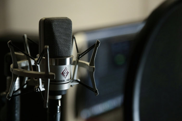 Condenser microphone in shock mount studio setup