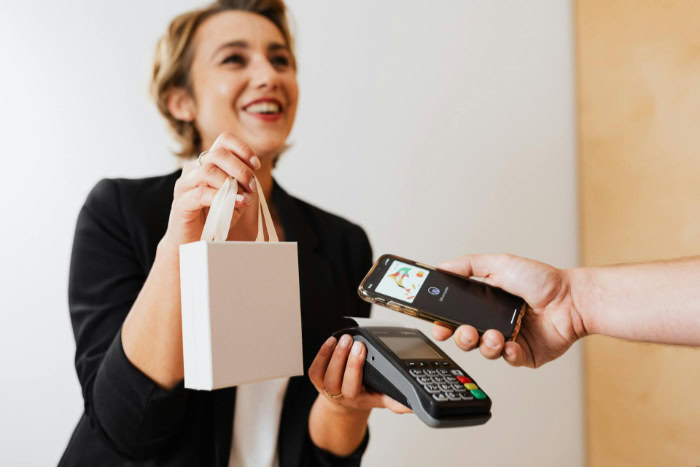 Contactless payment using a phone at a retail store