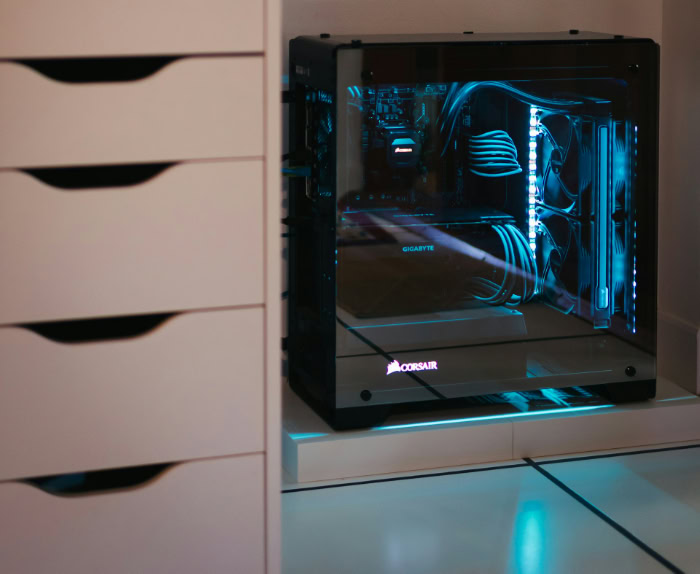 Corsair gaming PC with blue RGB lighting setup