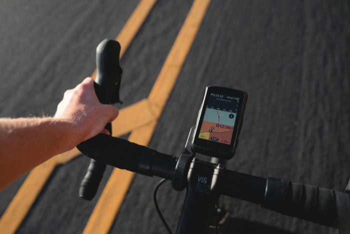 Cycling GPS computer mounted on bicycle handlebars