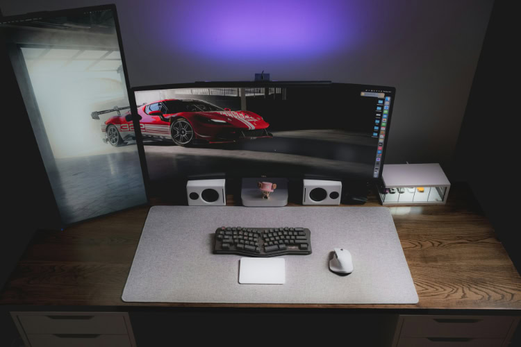 Dell curved monitor setup with ergonomic keyboard