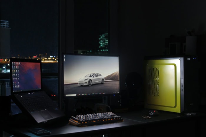 Desktop setup with dual monitors and a gaming PC