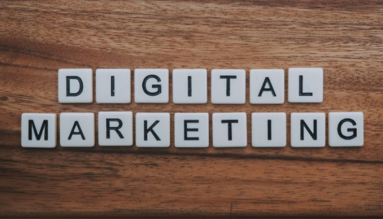 Digital marketing artwork on wooden surface