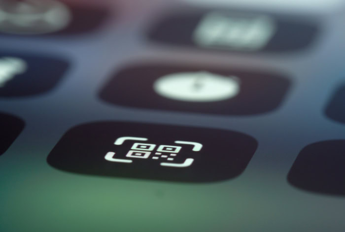 Digital QR code scanner icon on mobile screen