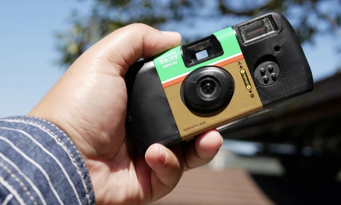 Disposable camera on hand