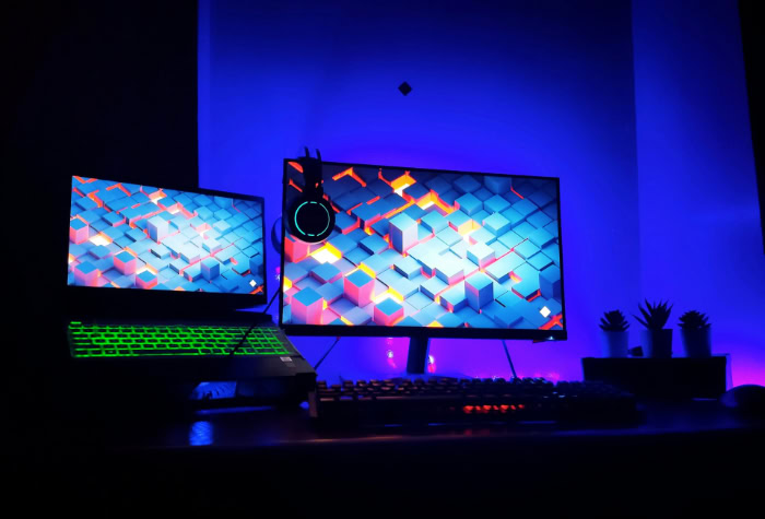 Dual monitor gaming setup with RGB lighting