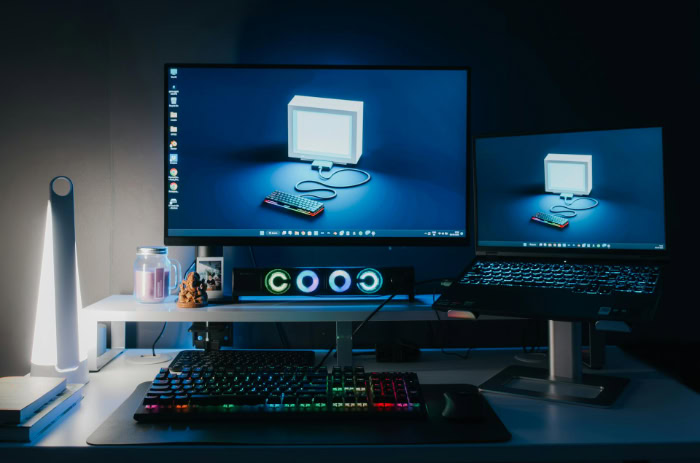 Dual monitor gaming setup with RGB mechanical keyboard
