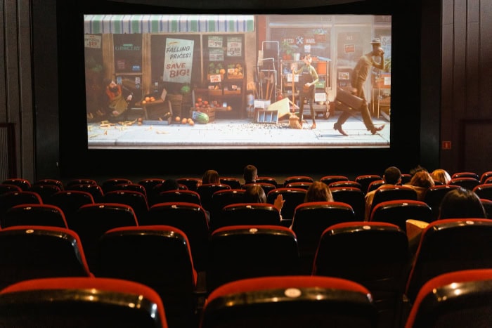 Empty movie theater with audience watching an animated film