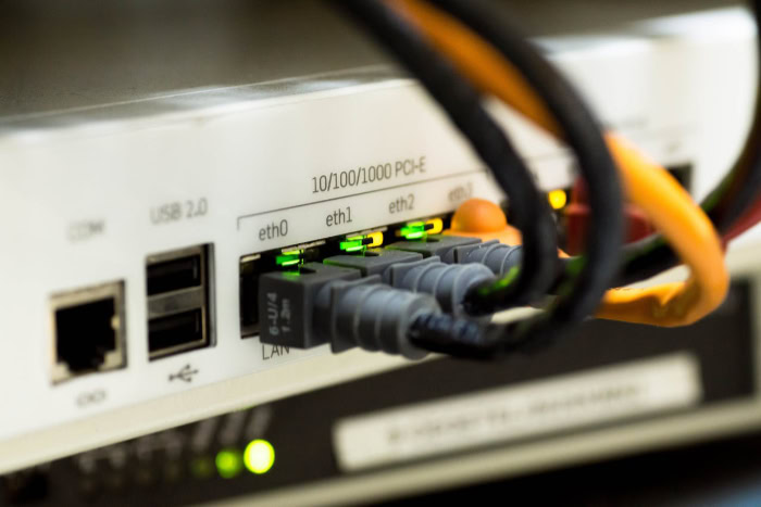 Ethernet cables connected to a router LAN ports